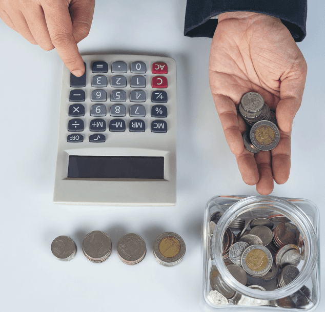 A calculator and coins — Zakat calculation