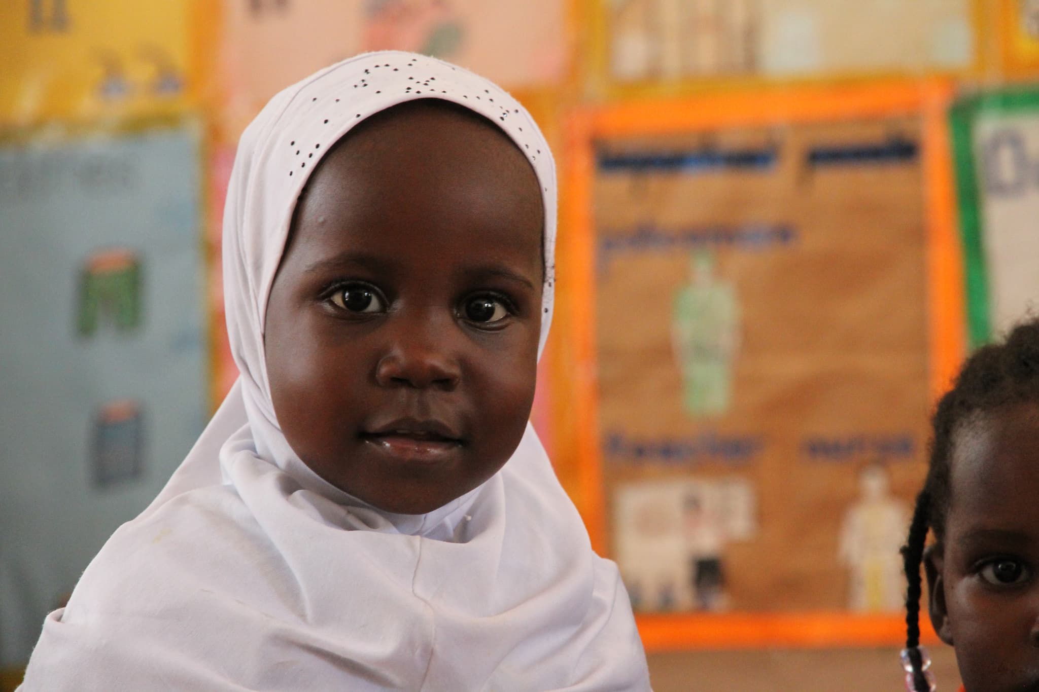 Children in a classroom supported by Muntada Aid's education programme