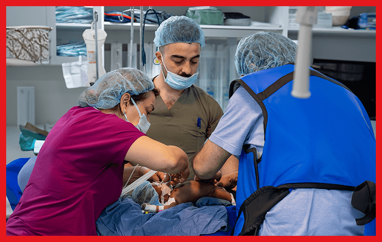 A Little Hearts surgical team operating on a child in Africa